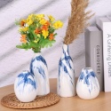 Zestaw 4 ceramicznych wazonów nowoczesny styl wiejski dekoracja biały niebieski